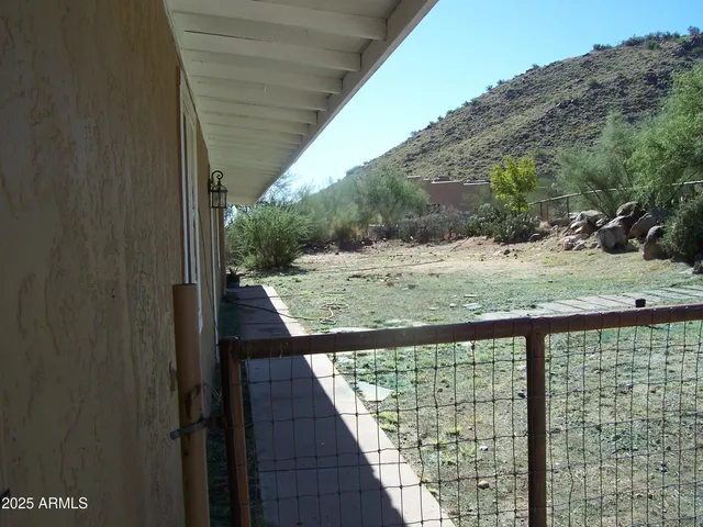 a view of a balcony with an outdoor space
