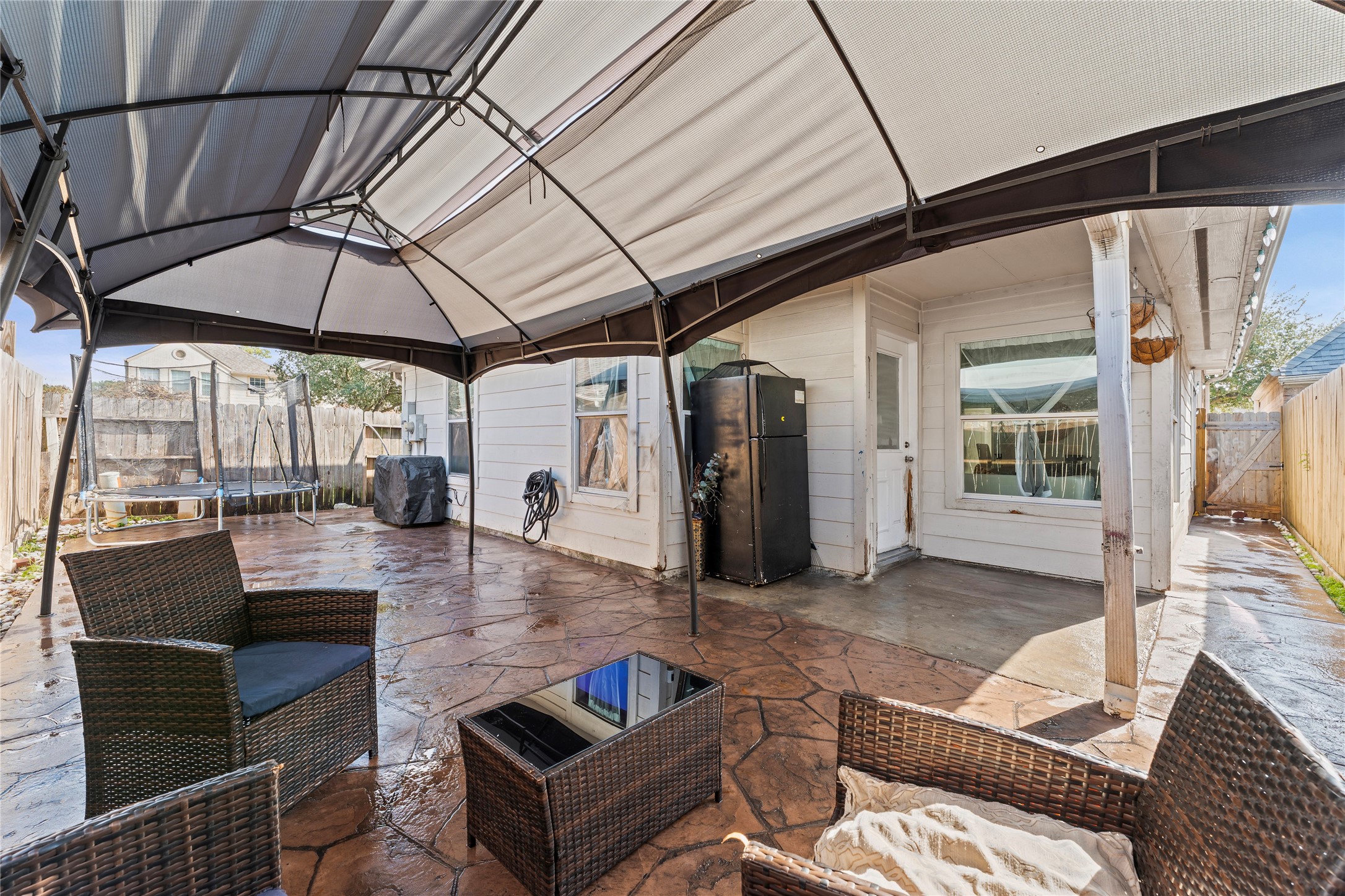 822 Green Pines Forest Houston, TX 77067 - Photo 16 of 18 a outdoor space with patio the couches and a potted plant