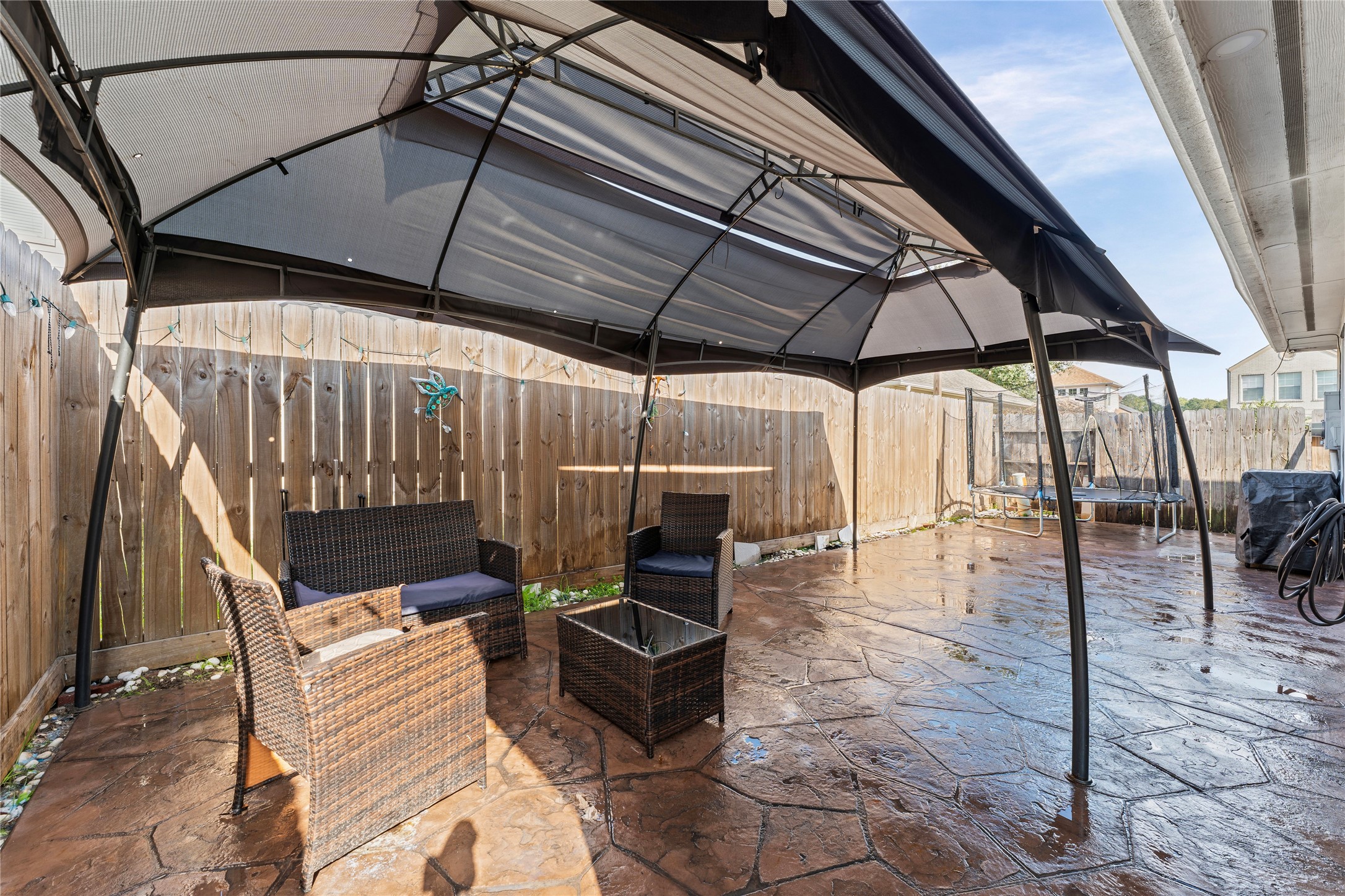 822 Green Pines Forest Houston, TX 77067 - Photo 17 of 18 a patio with table and chairs