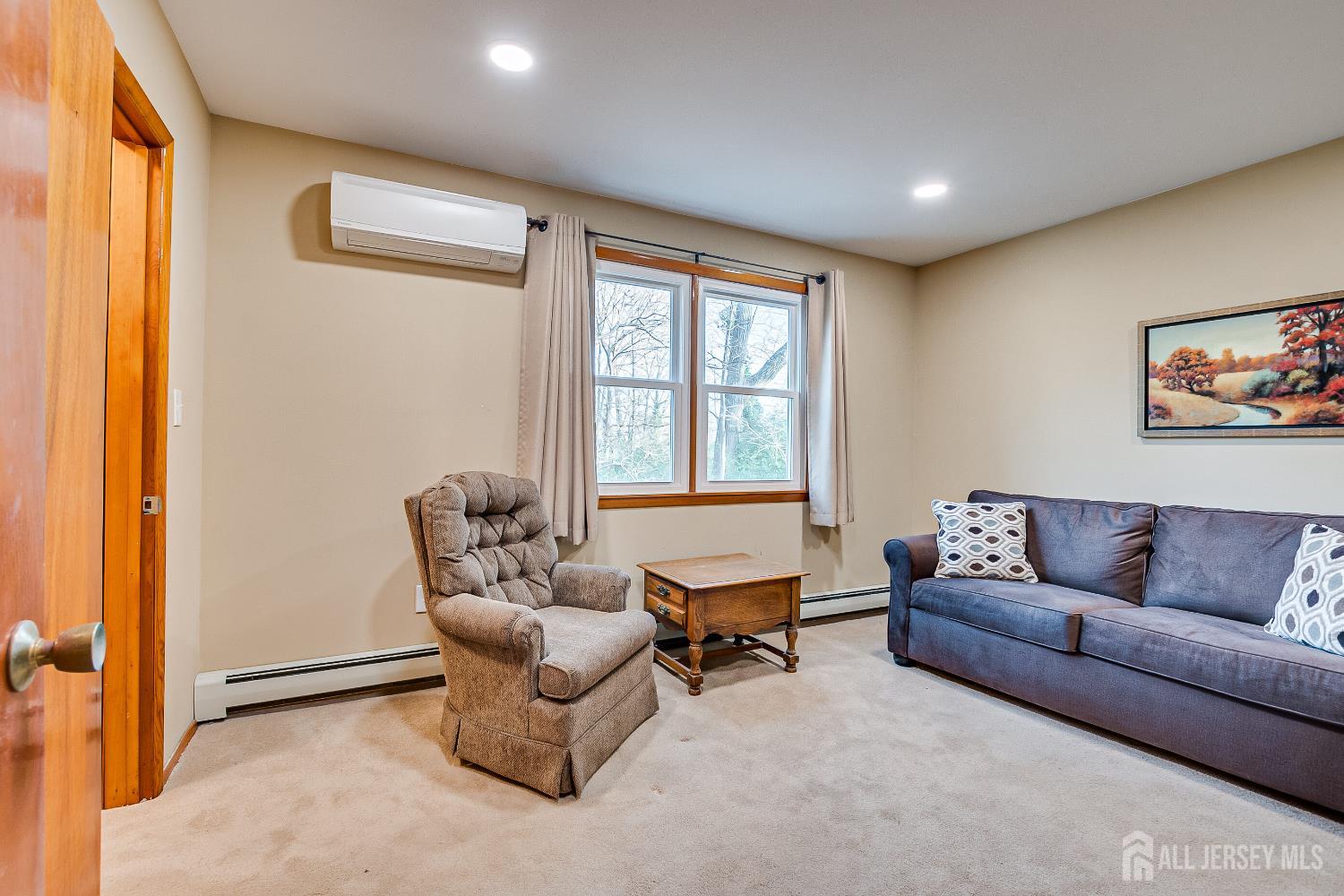 92 Coleman Street Edison, NJ 08817 - Photo 16 of 32 a living room with furniture and a window