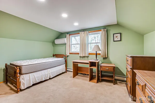 a room with furniture and a window