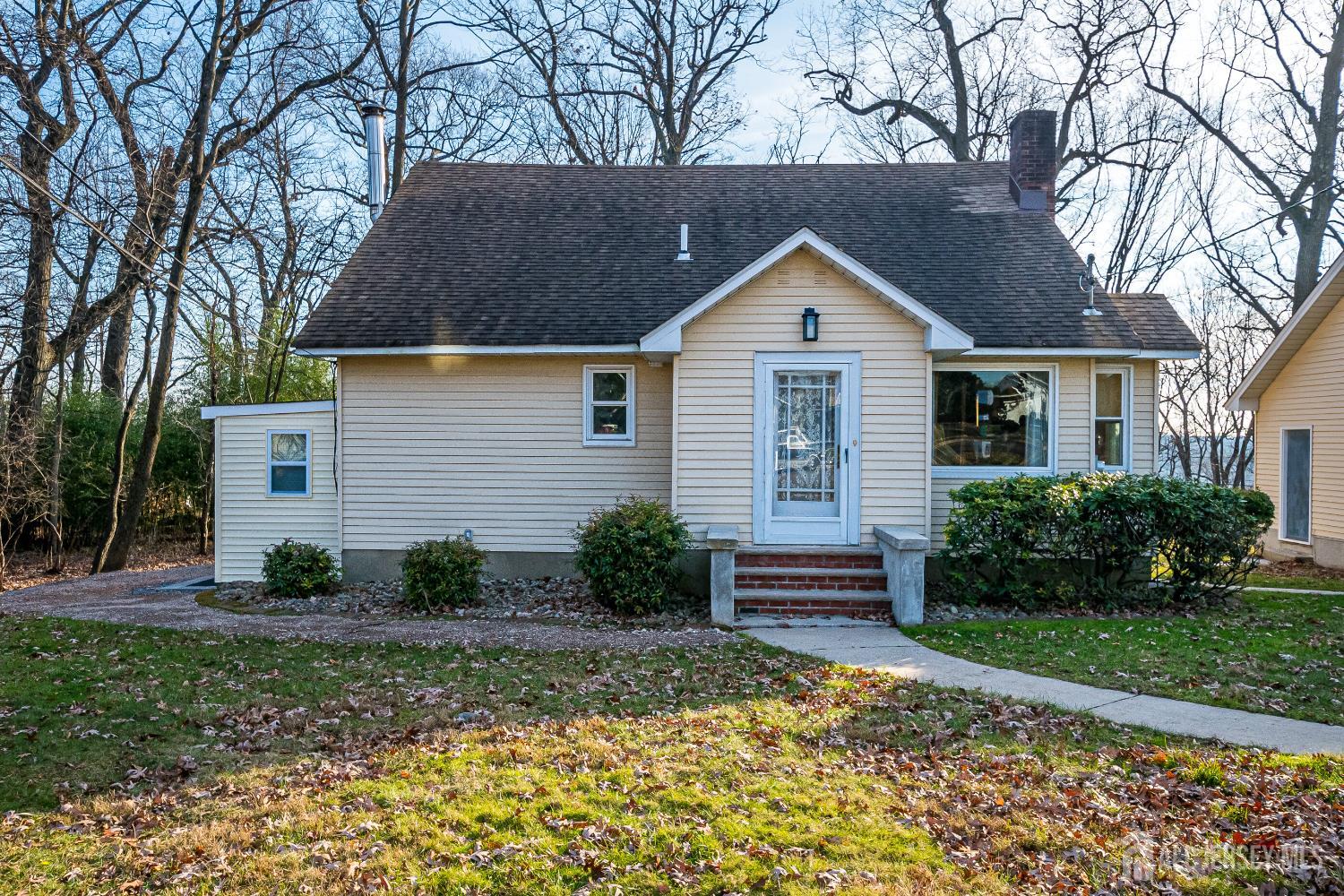 92 Coleman Street Edison, NJ 08817 - Photo 2 of 32 a front view of a house with garden