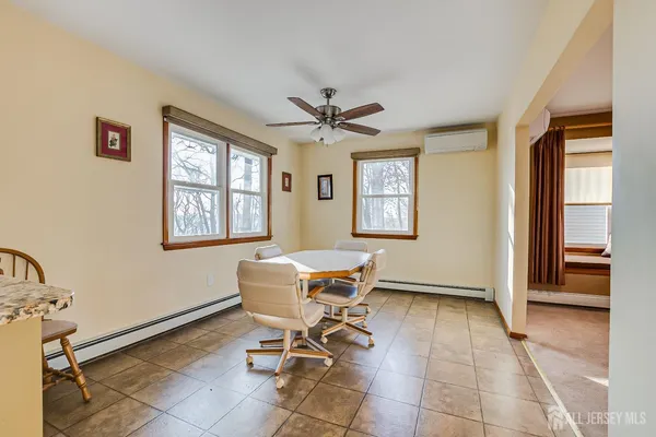 a workspace with furniture and window