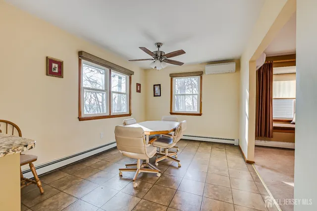 a workspace with furniture and window