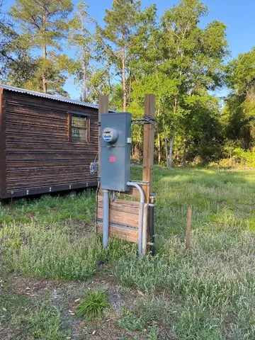 a backyard of a house with lots of green space