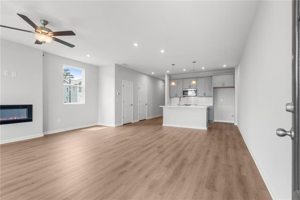 115 Pk Rdg Circle Cartersville, GA 30120 - Photo 3 of 30 a view of a kitchen with a sink and a refrigerator