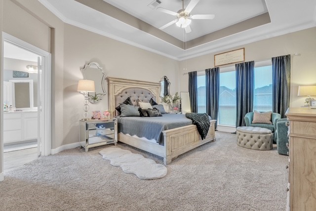 1541 North Blue Bonnet Lane Angleton, TX 77515 - Photo 18 of 28 a bedroom with a bed couch and window