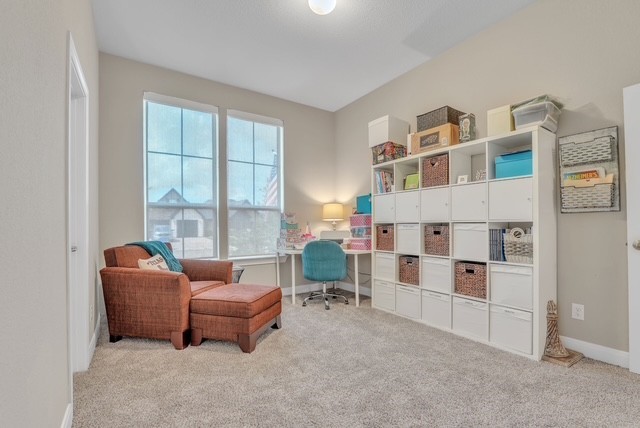 1541 North Blue Bonnet Lane Angleton, TX 77515 - Photo 22 of 28 a living room with furniture and a large window