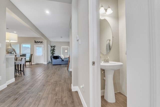 1541 North Blue Bonnet Lane Angleton, TX 77515 - Photo 7 of 28 wooden floor in a gallery