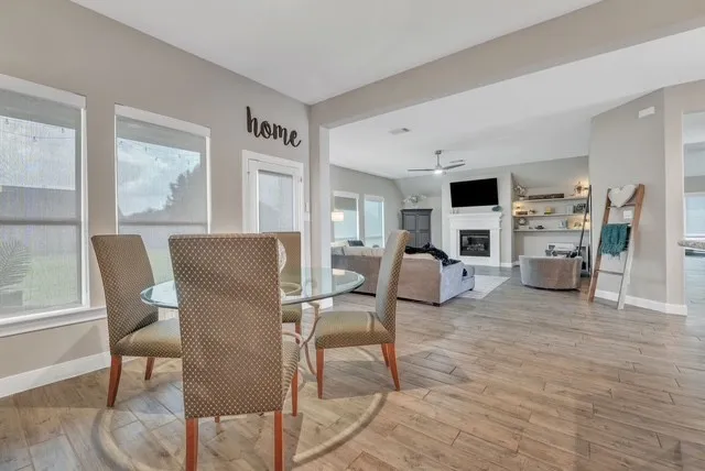 a living room with furniture and a table