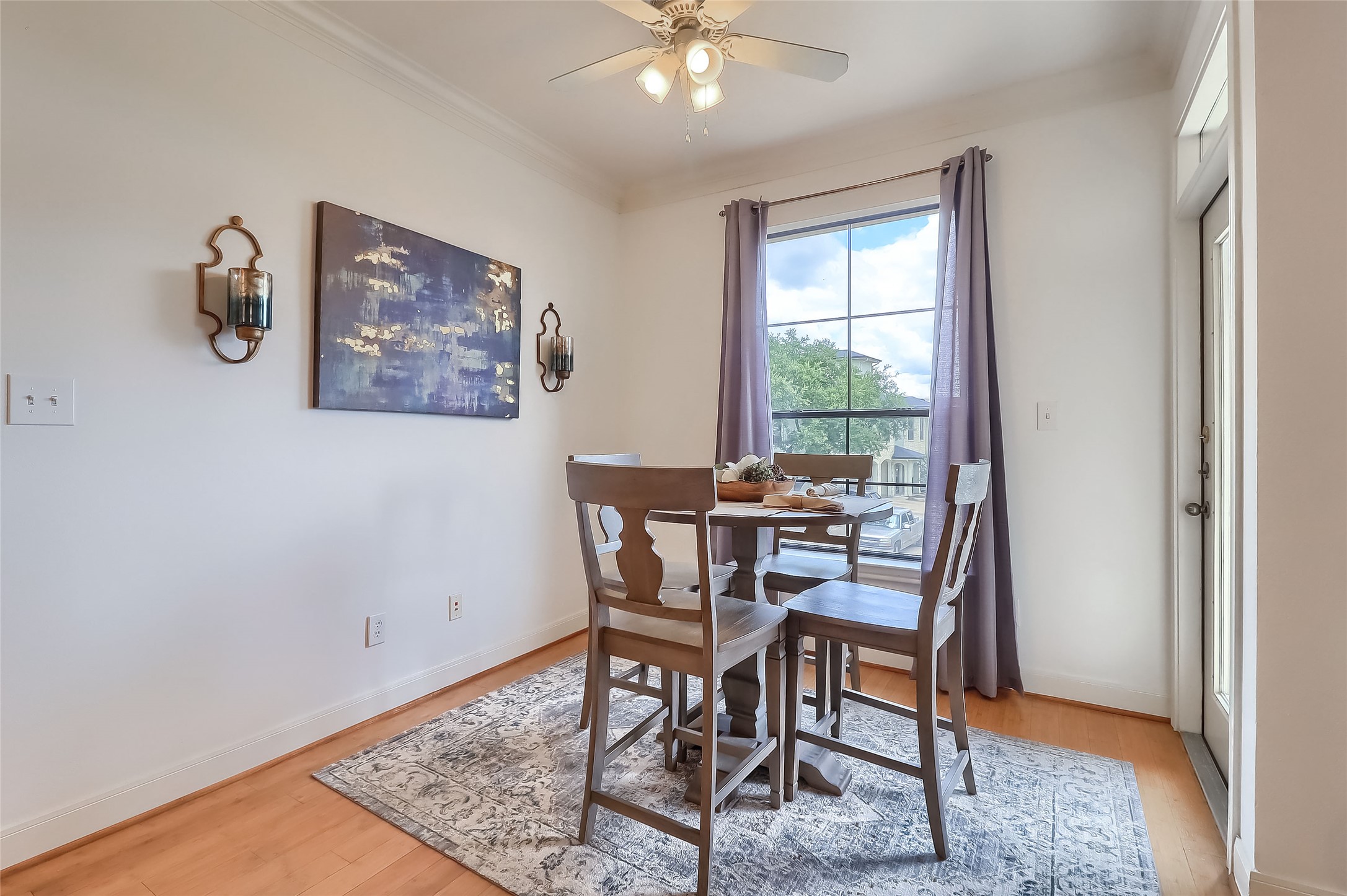 7701 Rialto Boulevard, Unit 1128 Austin, TX 78735 - Photo 10 of 35 a view of a dining room with furniture and a window