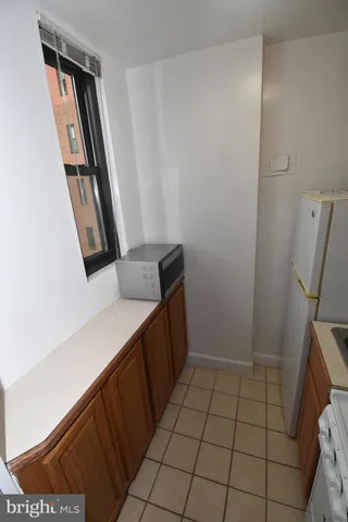 a bathroom with a toilet a sink and bathtub