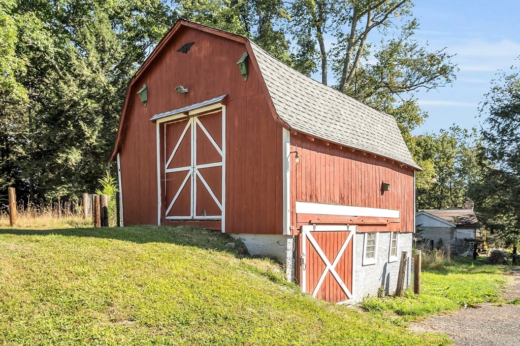 4287 South Athol Road Athol, MA 01331 - Photo 13 of 42 a front view of a house with a yard