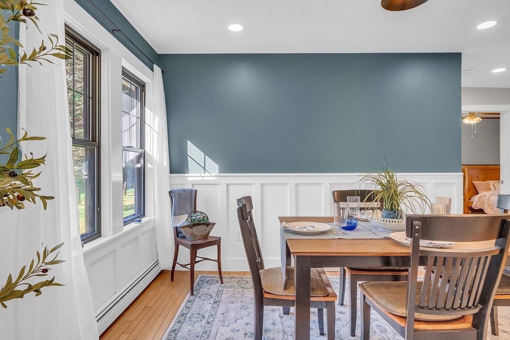 4287 South Athol Road Athol, MA 01331 - Photo 23 of 42 a dining room with furniture and wooden floor