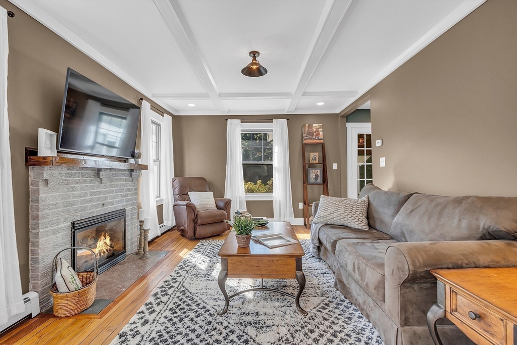 4287 South Athol Road Athol, MA 01331 - Photo 28 of 42 a living room with furniture and a fireplace