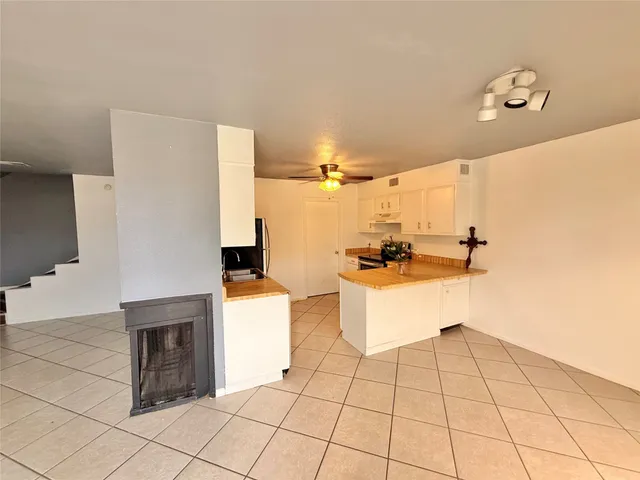 a bathroom with a sink a mirror and a shower