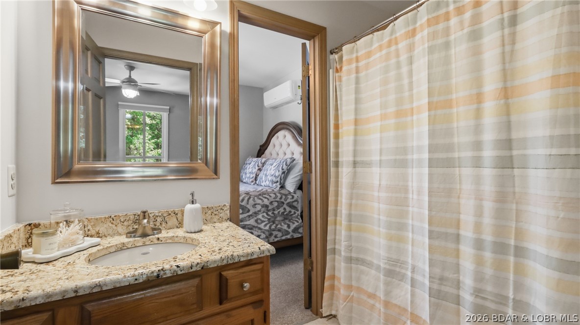 1069 Indian Hill Road Sunrise Beach, MO 65079 - Photo 20 of 54 Jack & Jill Full Bath Upstairs