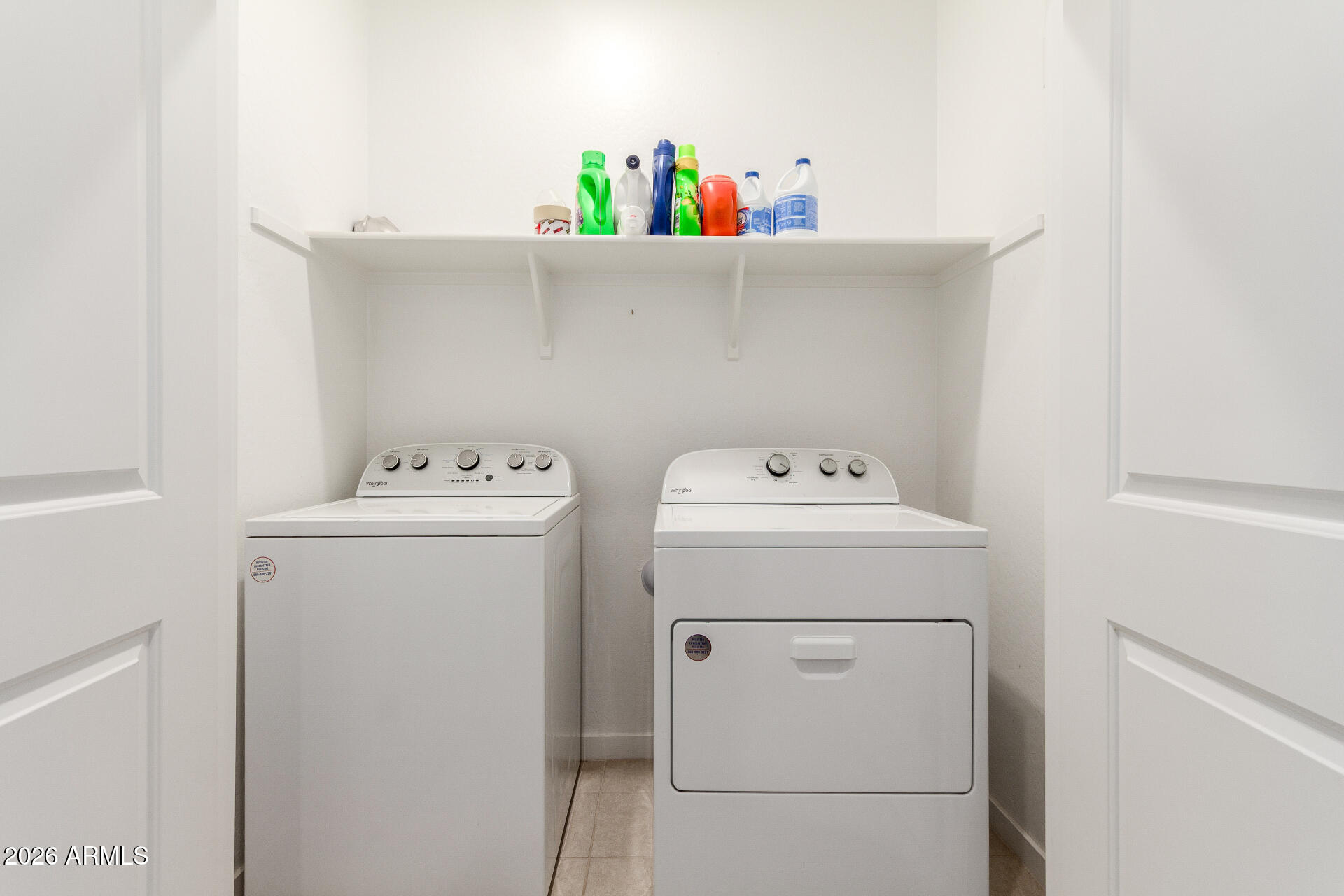10734 West Bloch Road Tolleson, AZ 85353 - Photo 18 of 20 a utility room with dryer and washer