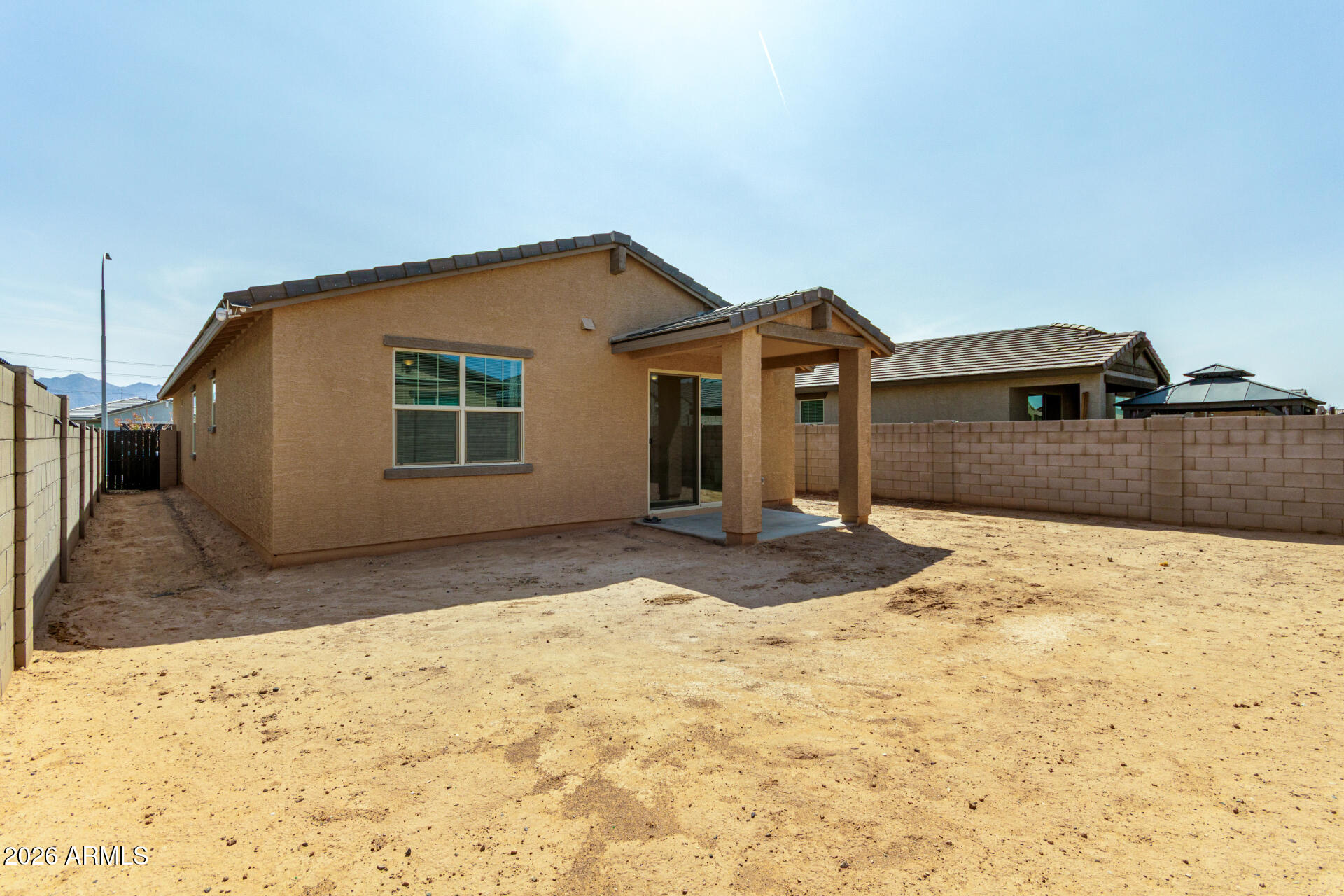 10734 West Bloch Road Tolleson, AZ 85353 - Photo 19 of 20 a view of garage and yard