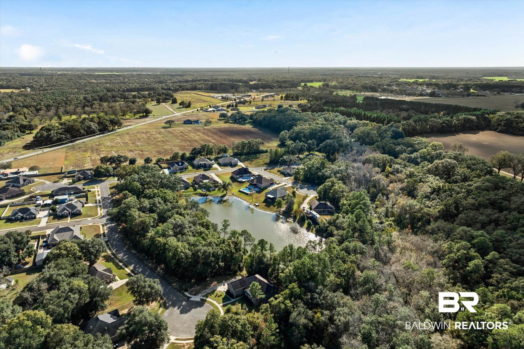 0 Acorn Way Grand Bay, AL 36541 - Photo 14 of 17 View of property location with a forest and a large body of water