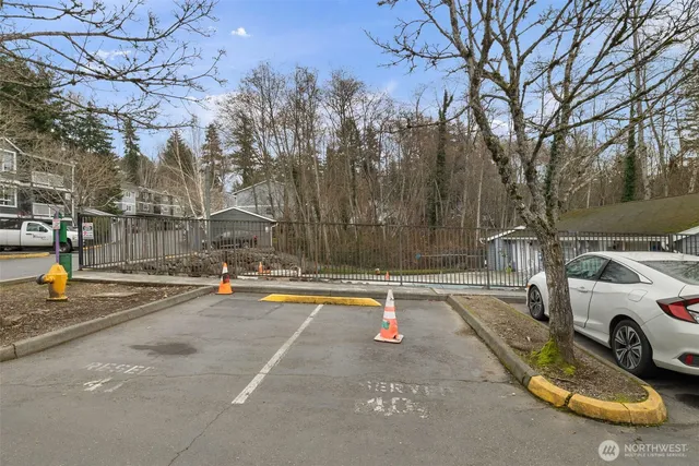 a view of a street with cars