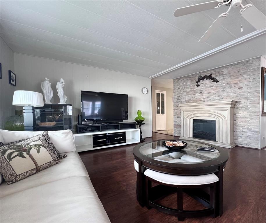 1100 South Belcher Road, Unit 772 Largo, FL 33771 - Photo 17 of 84 a living room with furniture and a fireplace