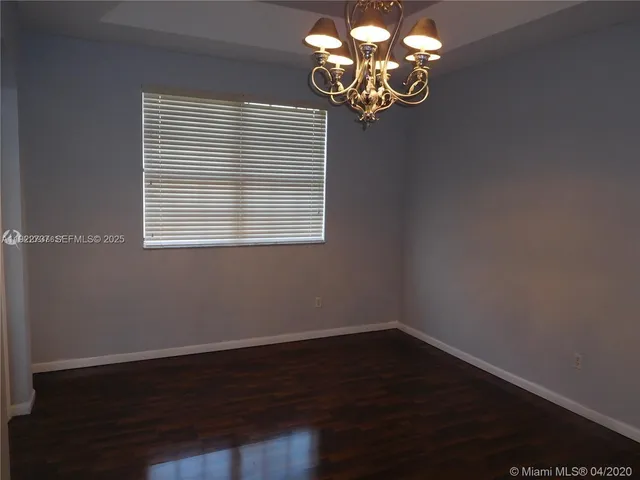 a view of a chandelier in a room