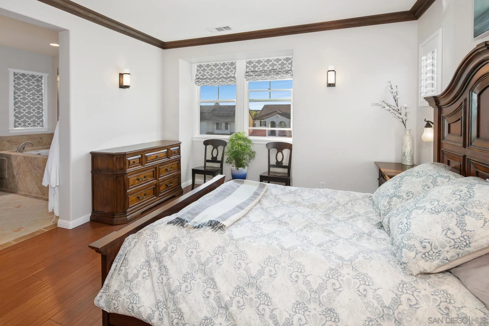 16633 Deer Ridge Road San Diego, CA 92127 - Photo 20 of 53 a bedroom with a bed and a dresser