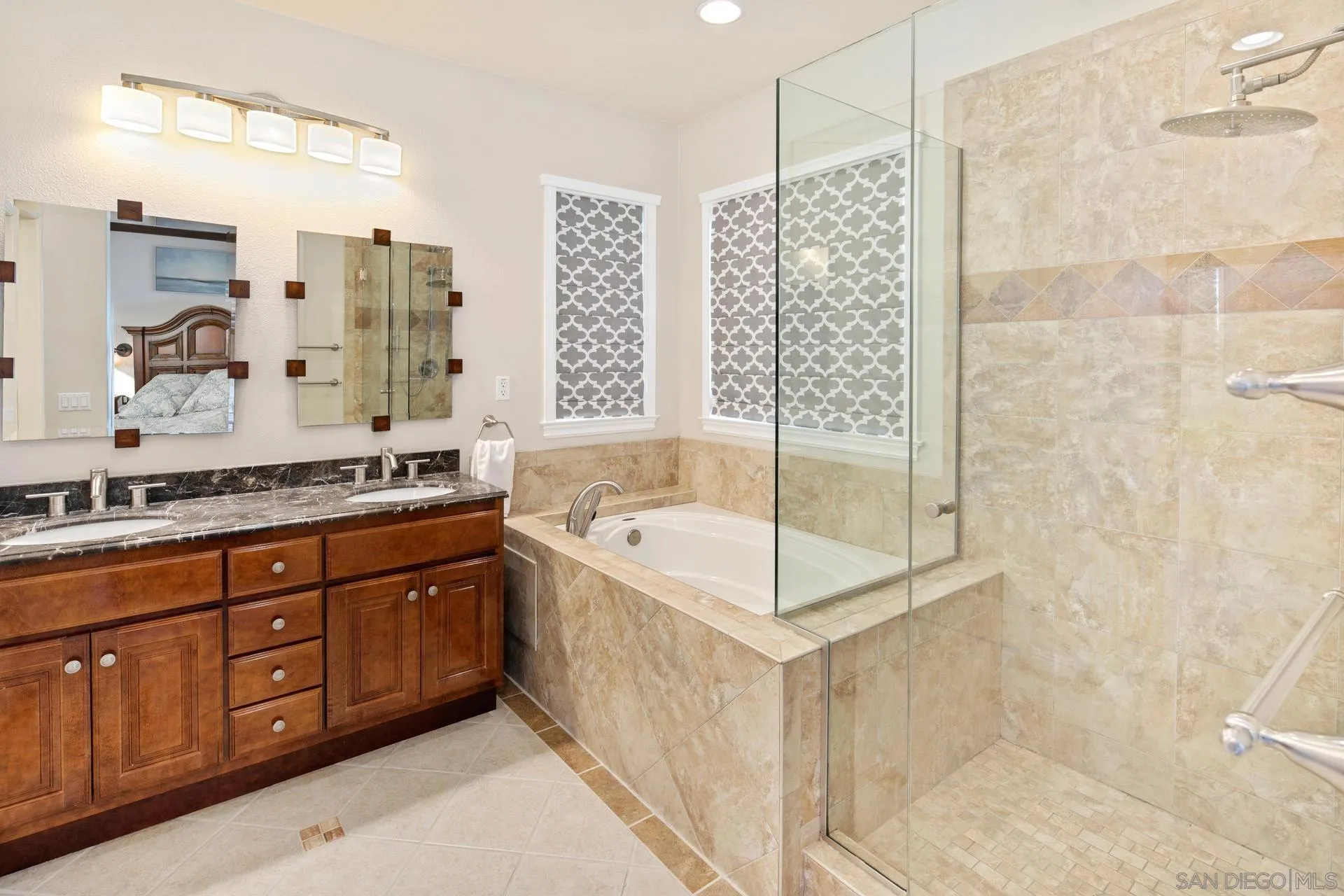 16633 Deer Ridge Road San Diego, CA 92127 - Photo 21 of 53 a bathroom with a tub sink and mirror