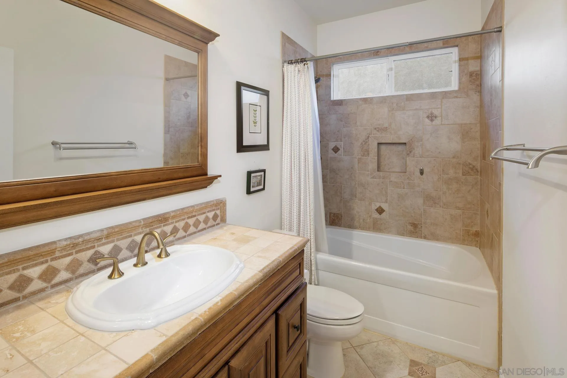 16633 Deer Ridge Road San Diego, CA 92127 - Photo 26 of 53 a bathroom with a sink toilet vanity and shower