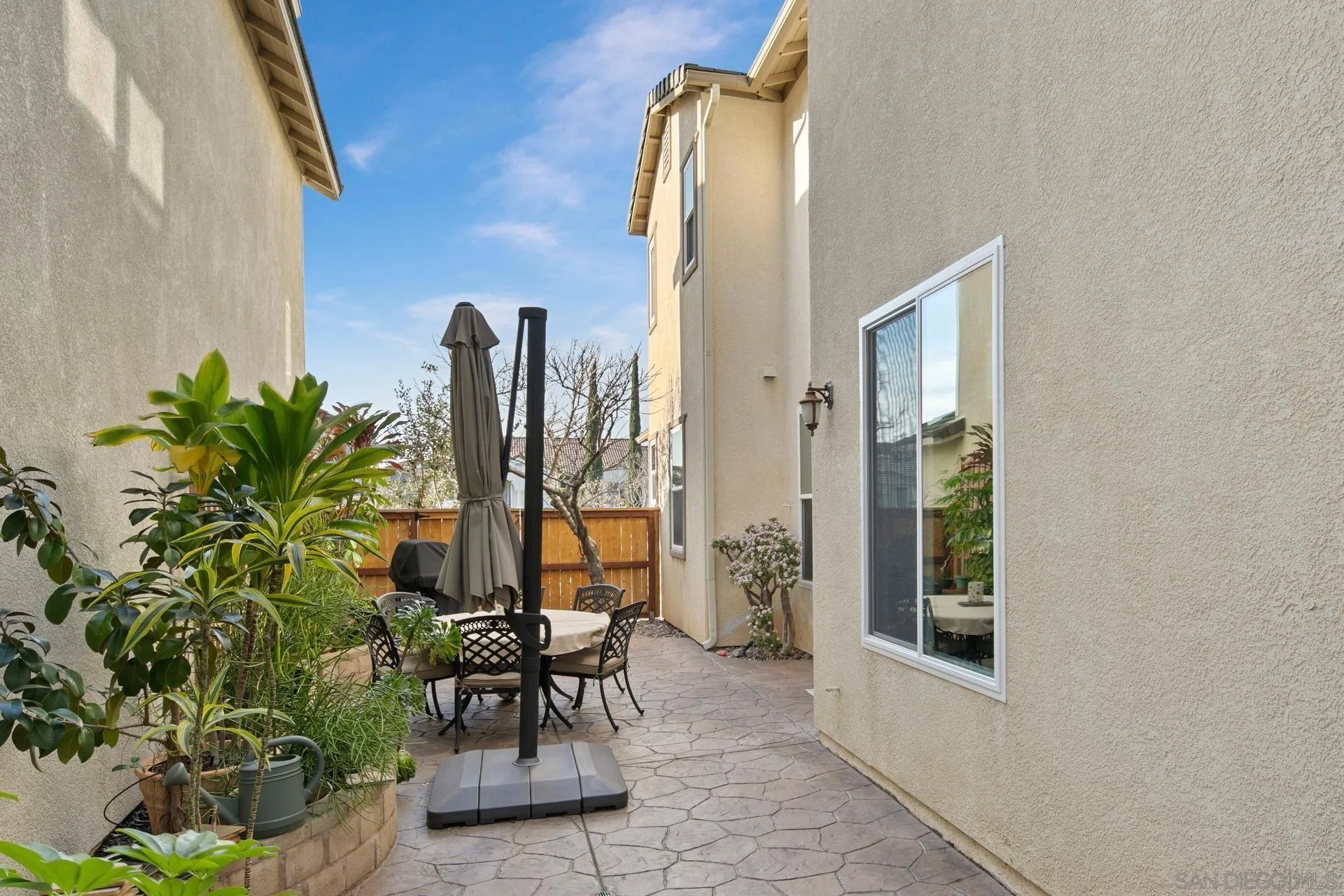 16633 Deer Ridge Road San Diego, CA 92127 - Photo 29 of 53 a view of a dinning table and chairs in patio