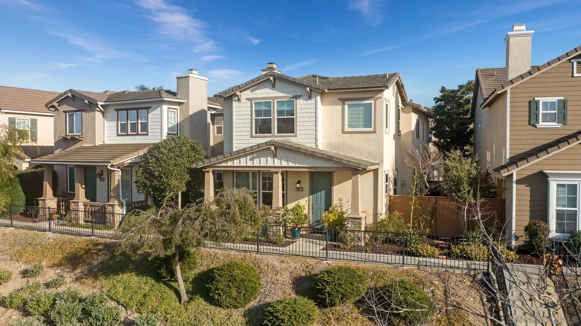 16633 Deer Ridge Road San Diego, CA 92127 - Photo 3 of 53 a front view of a house with a yard