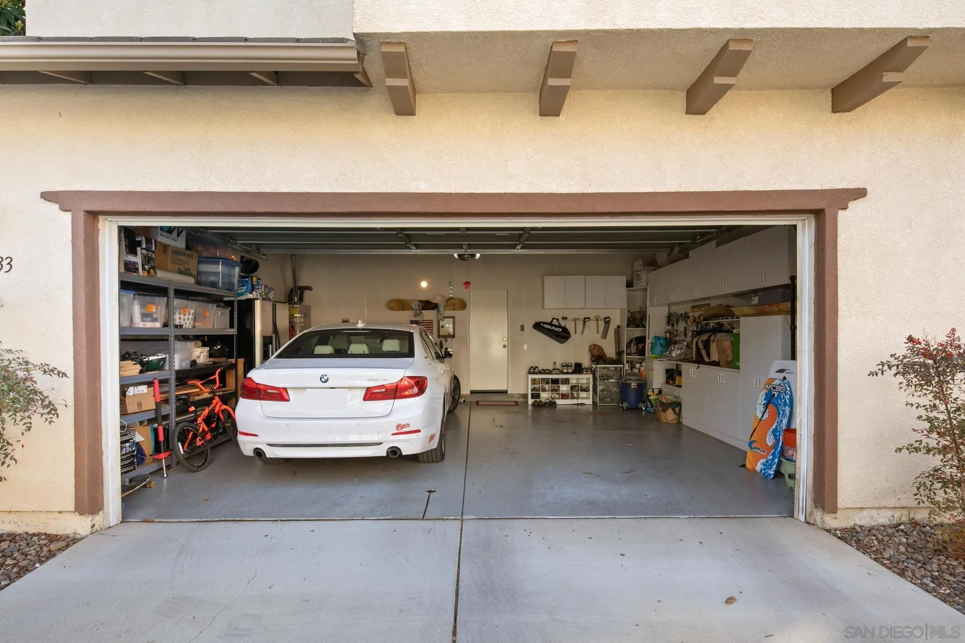 16633 Deer Ridge Road San Diego, CA 92127 - Photo 33 of 53 a car parked in garage