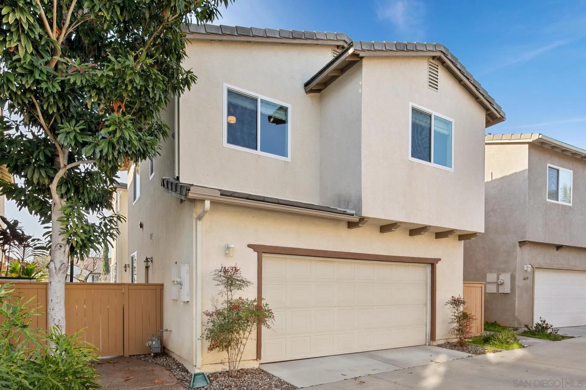 16633 Deer Ridge Road San Diego, CA 92127 - Photo 34 of 53 a view of a house with a garage