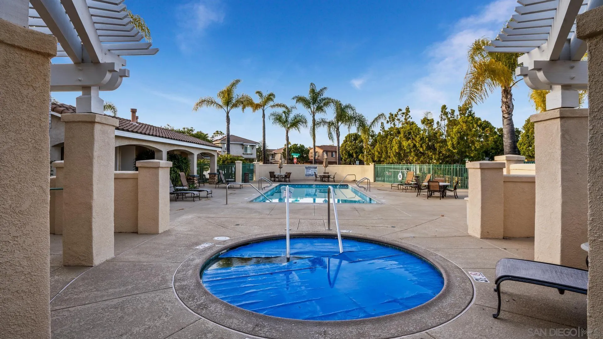 16633 Deer Ridge Road San Diego, CA 92127 - Photo 37 of 53 a view of a swimming pool with sitting area