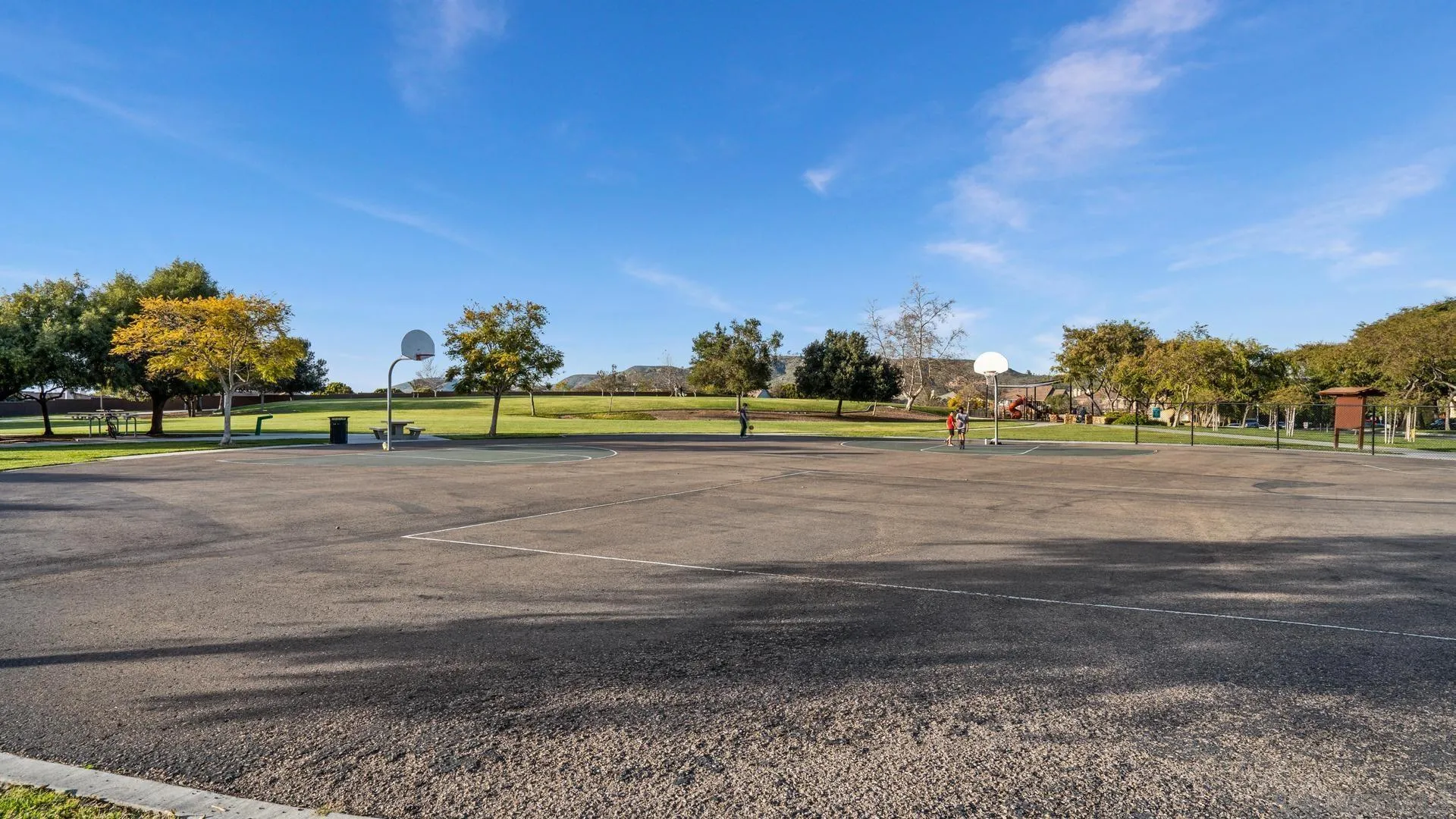 16633 Deer Ridge Road San Diego, CA 92127 - Photo 43 of 53 a view of a golf course with a road