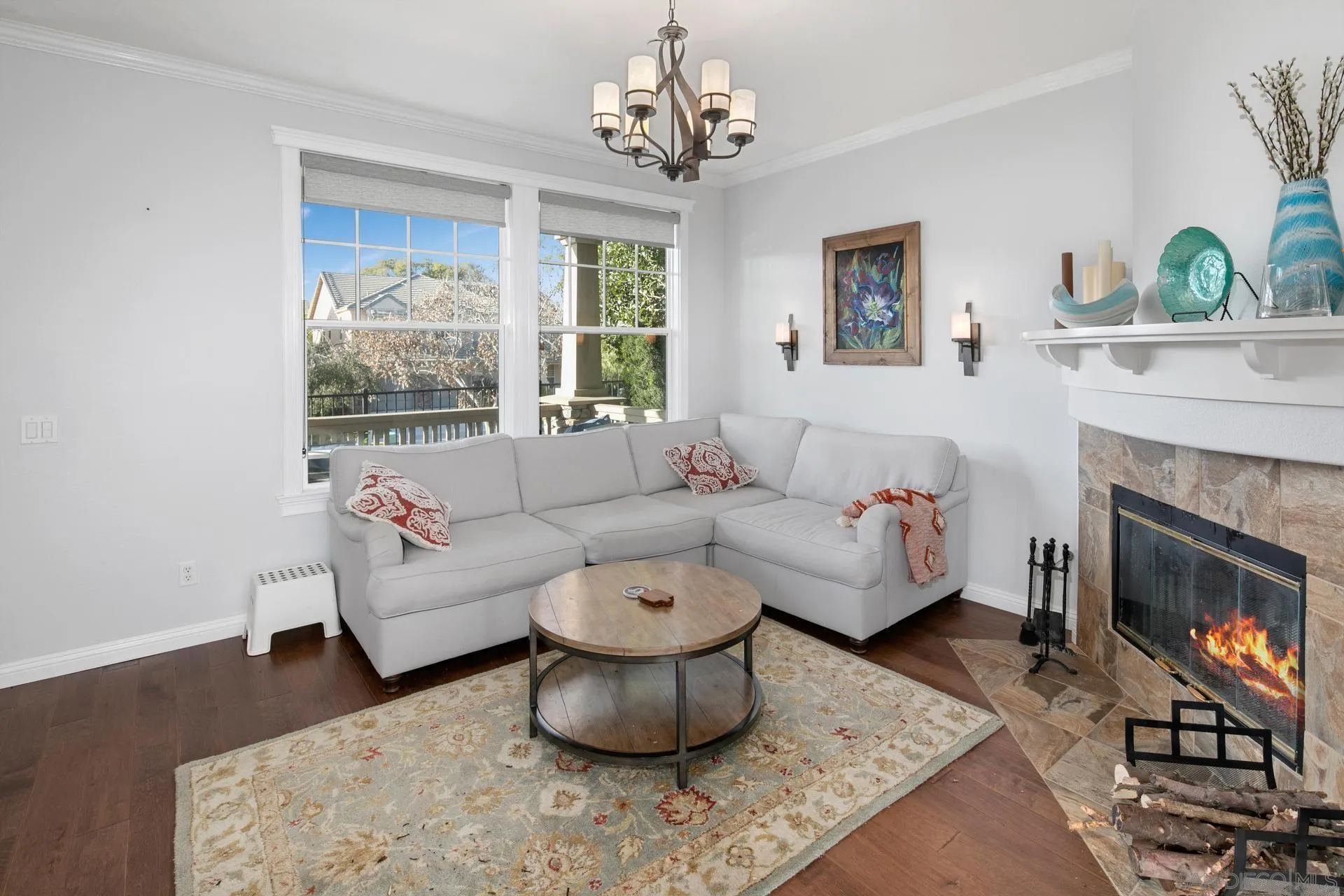 16633 Deer Ridge Road San Diego, CA 92127 - Photo 8 of 53 a living room with furniture a fireplace and a table