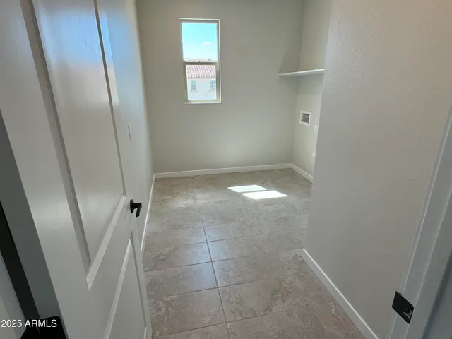 a view of swimming pool with an outdoor seating