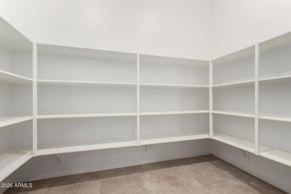 a view of an empty room with empty racks
