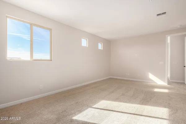 an empty room with windows