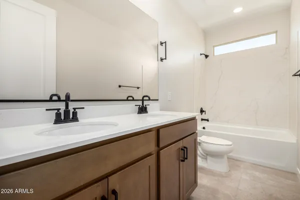 an empty room with a empty space and a window