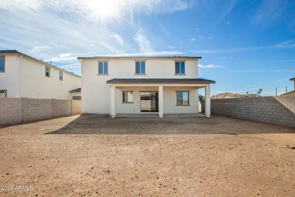 a front view of a house with a garage