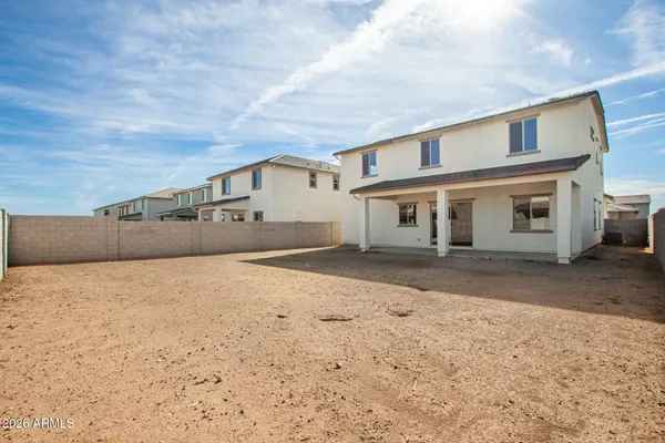 a front view of a house with a garage