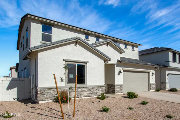 a front view of a house with patio