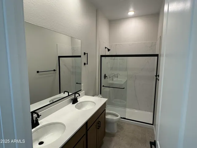a bathroom with a sink and mirror