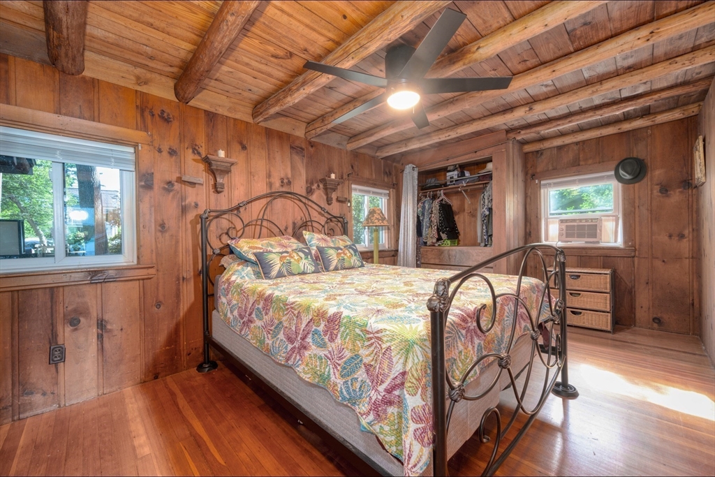 9 Overbrook Road Pembroke, MA 02359 - Photo 14 of 21 a bed sitting in a bedroom next to a window