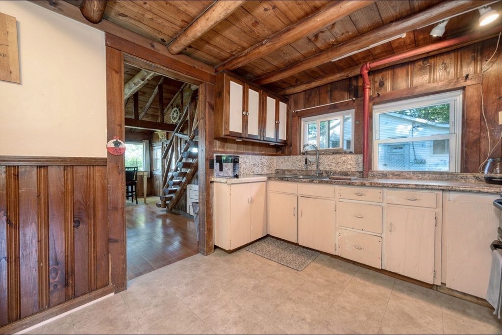 9 Overbrook Road Pembroke, MA 02359 - Photo 19 of 21 a kitchen with cabinets and wooden floors
