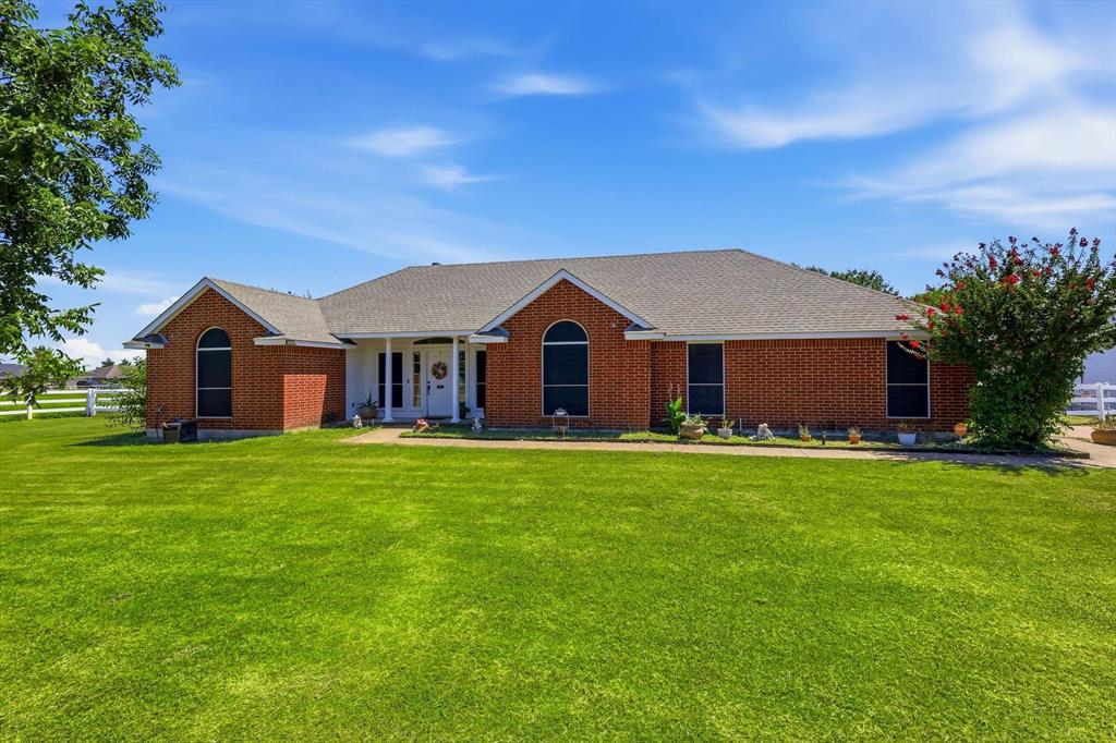 1328 Pierce Road Red Oak, TX 75154 - Photo 1 of 40 Traditional brick exterior residence with a covered front porch featuring white columns and a white front door