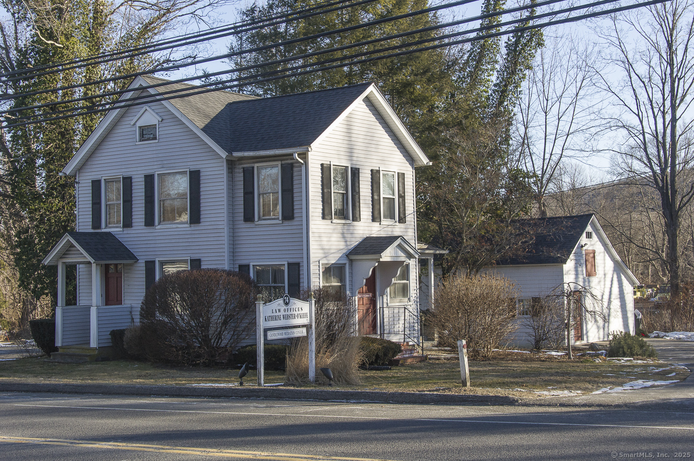 74 Park Lane Road New Milford, CT 06776 - Photo 2 of 22 a front view of a house with garden