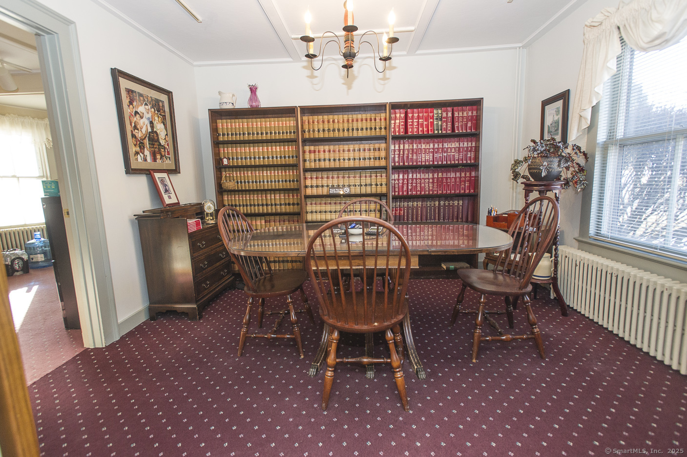 74 Park Lane Road New Milford, CT 06776 - Photo 7 of 22 a view of a dining room with furniture and chandelier
